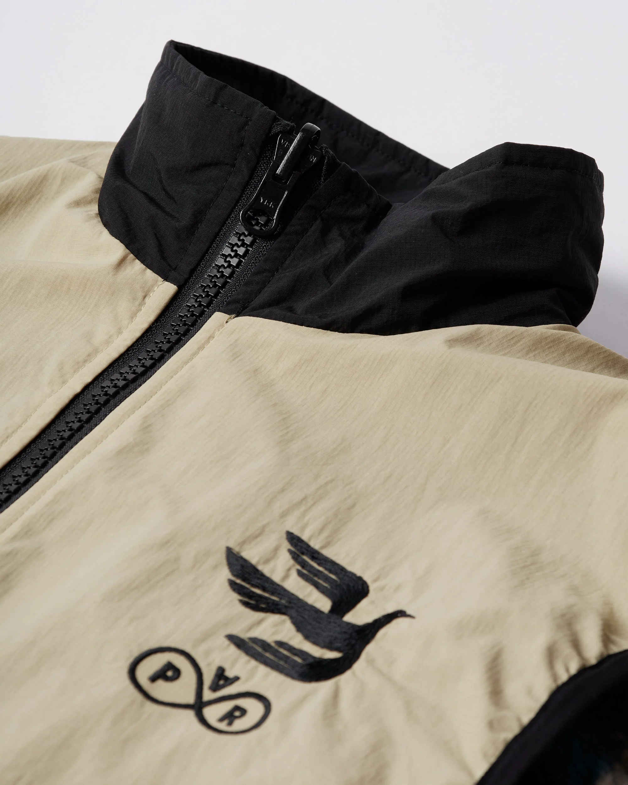Infinite bird reversible vest - Image 10